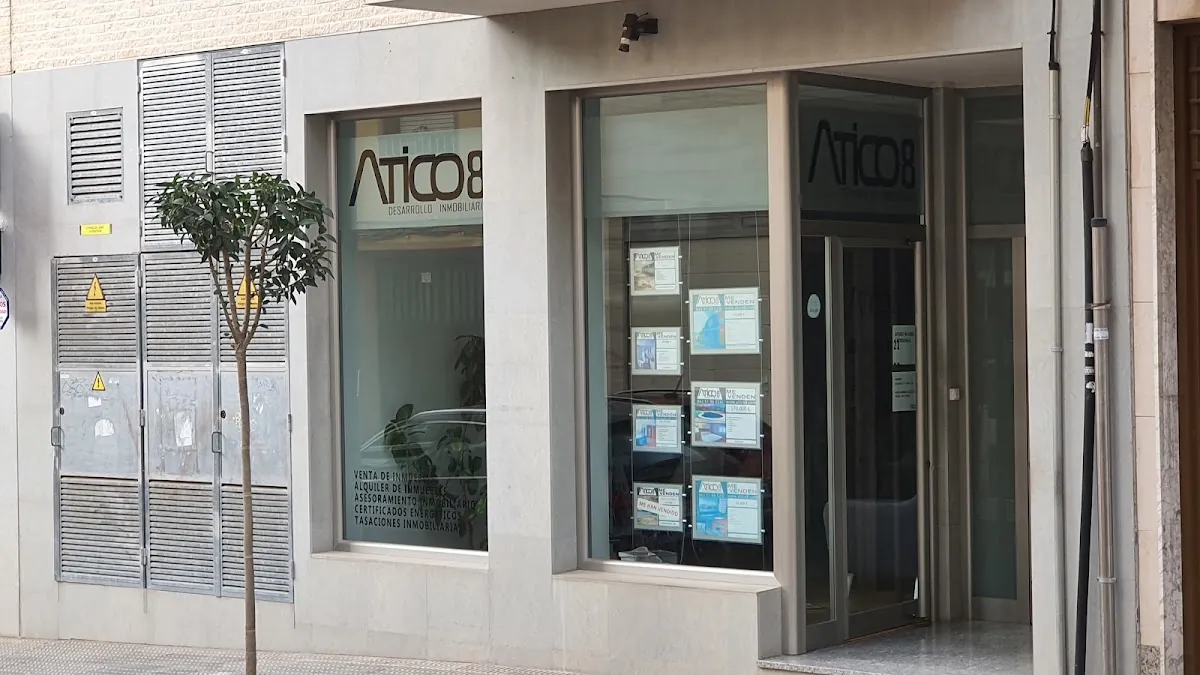 AT, inmobiliaria